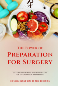 Book cover showing heart shaped bowl with a selection of fresh fruit and veg inside. In the background is a prescription pad, an apple, stethoscope and set of weights.