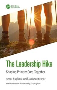 White book cover with photo of the legs of two people wearing hiking boots and using walking poles with the sun rising behind them.