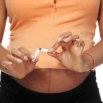 pregnant_woman_breaking_cigarette