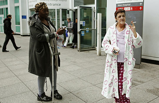 Meaning of Smokers Outside the Hospital Doors by Editors