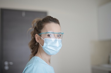 An colour image of a nurse wearing full PPE during the Covid-19 pandemic.