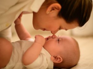 Picture of a baby with mother