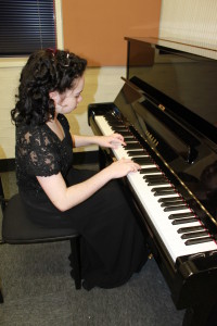 Miss Imogen Scott-Parker preparing for a concert