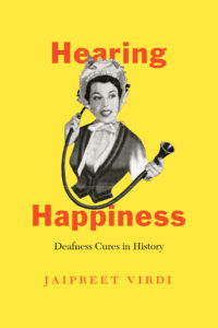 Yellow cover, red words, black and white image of a woman with a hearing device