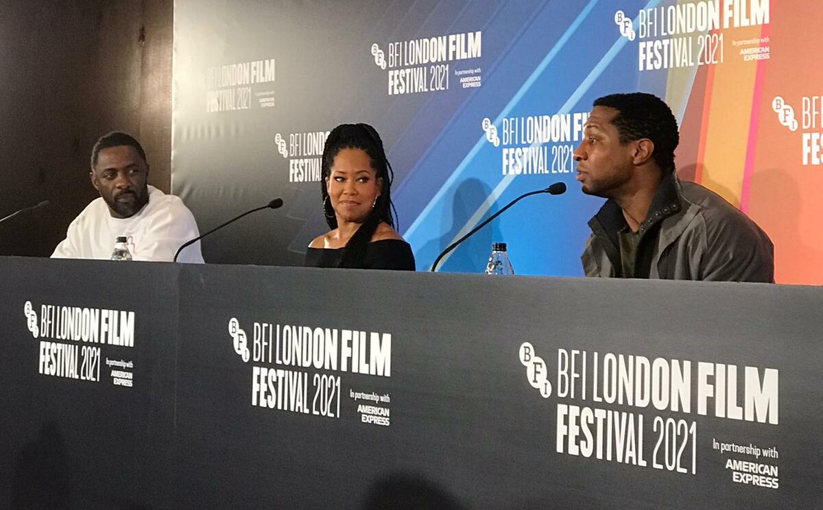 Idris Elba, Regina King, and Jonathan Majors reflecting on their roles in 'The Harder They Fall'.