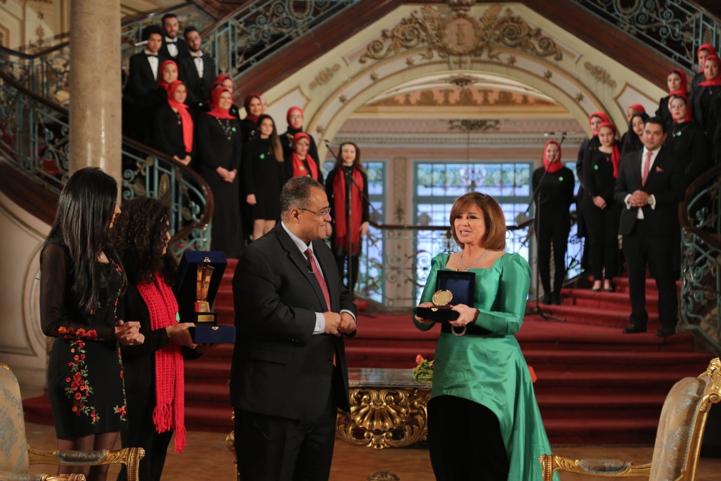 'Elham Shahin receiving an honorary award from Ain Shams University, Egypt in 2022'