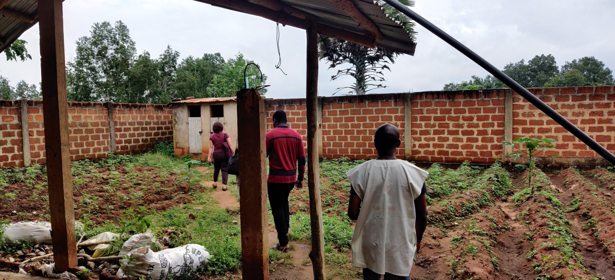 Latrines adjacent to vegetable garden in one of our visits to a farm in Benin.