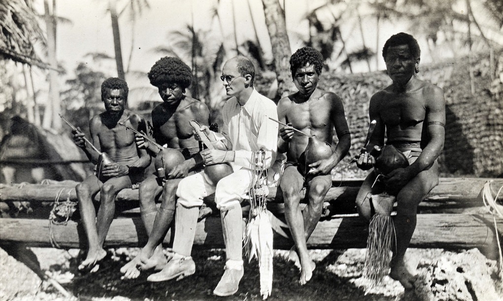 Figure 2. Malinowski with Trobriand Islanders, 1918.