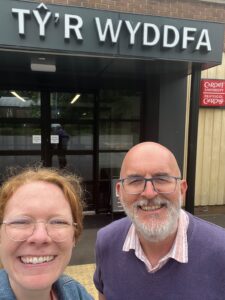 Photo of Kirstine Bøndergaard and Ben Hannigan outside Cardiff University 